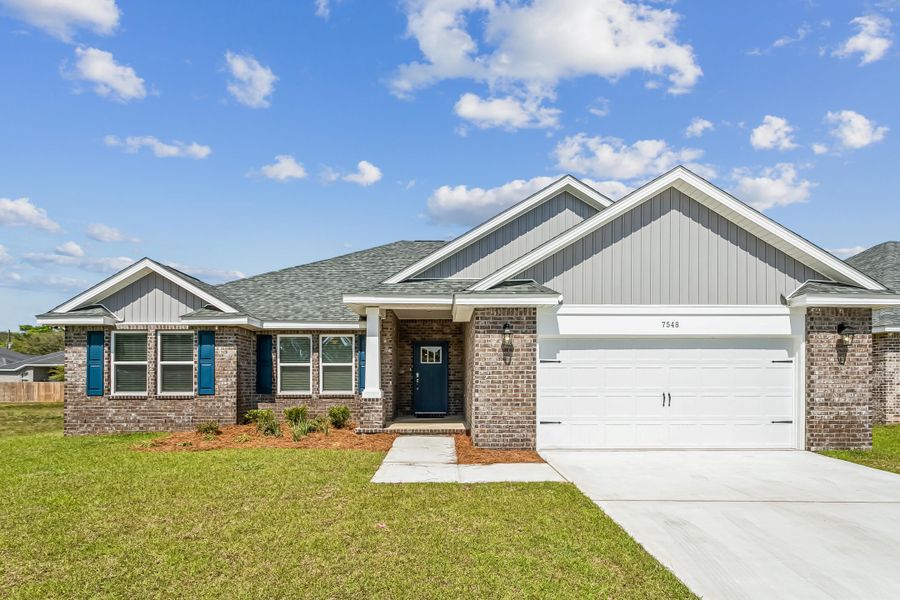 Representative exterior photo of a completed home built from the The Liberty by Herbst Homes in Buckeyes Landing, Navarre, FL (Image 28).
