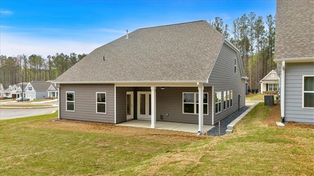 Exterior details and patio area of a home in Stratford at NatureWalk, Dallas (Image 30).