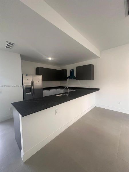 Furnished interior view inside a new home in , Fort Lauderdale (Image 5).