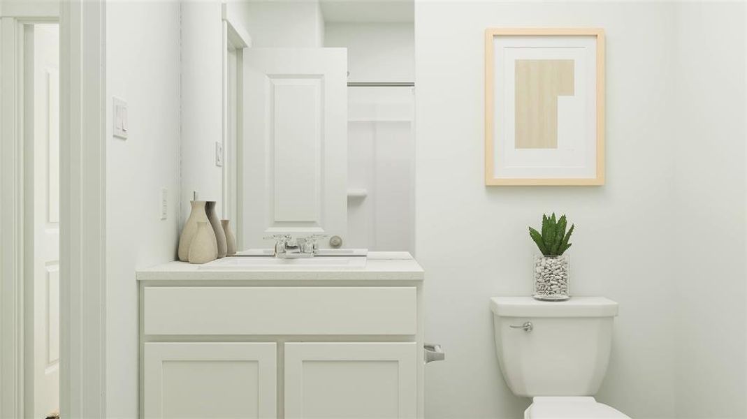 Bathroom with vanity and toilet