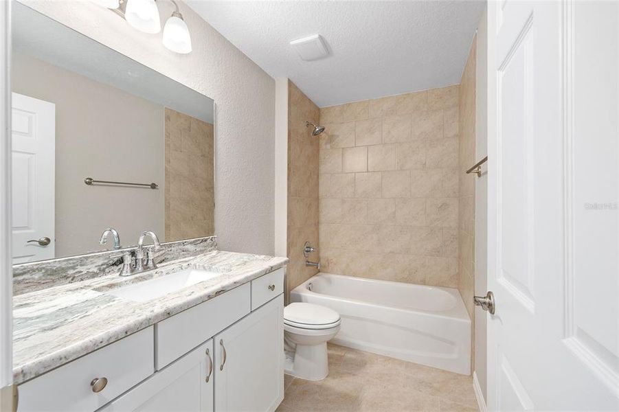 Furnished interior view inside a new home in , Dunnellon (Image 8).