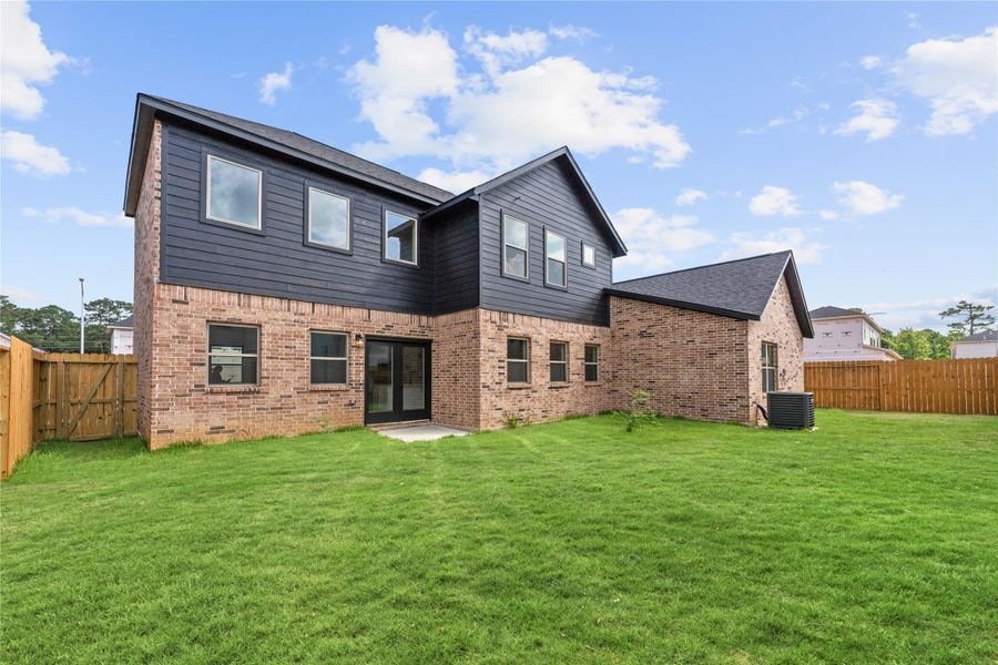 Exterior details and patio area of a home in , Spring (Image 2). Exterior details and patio area of a home in , Spring (Image 2).