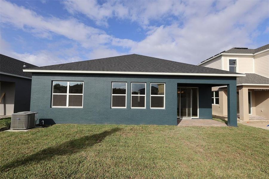 Exterior details and patio area of a home in Estates at Rivercrest, Sanford (Image 4).