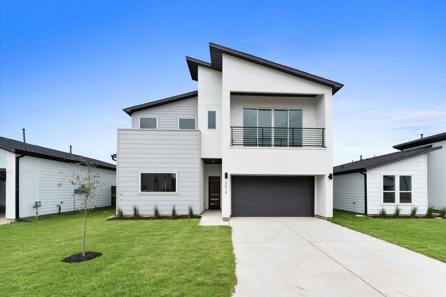Front exterior of a new home in , Missouri City, TX, highlighting curb appeal (Image 2). Front exterior of a new home in , Missouri City, TX, highlighting curb appeal (Image 2).