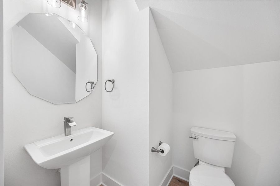 Half bathroom located on the 1st floor Half bathroom located on the 1st floor