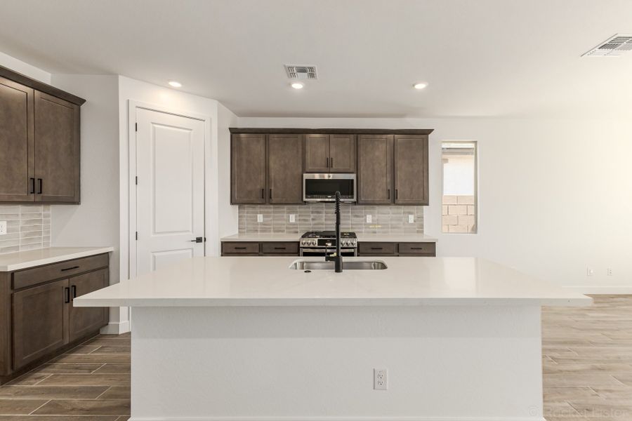 Furnished interior view inside a new home in Bella Vista Farms, San Tan Valley (Image 5).