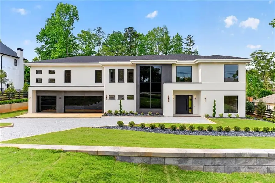 Front exterior of a new home in , Sugar Hill, GA, highlighting curb appeal (Image 27).