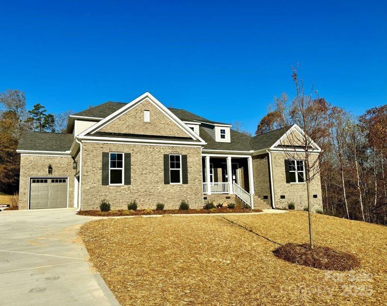 Front exterior of a new home in , Concord, NC, highlighting curb appeal (Image 2). Front exterior of a new home in , Concord, NC, highlighting curb appeal (Image 2).