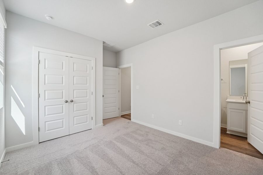 A room with white doors.