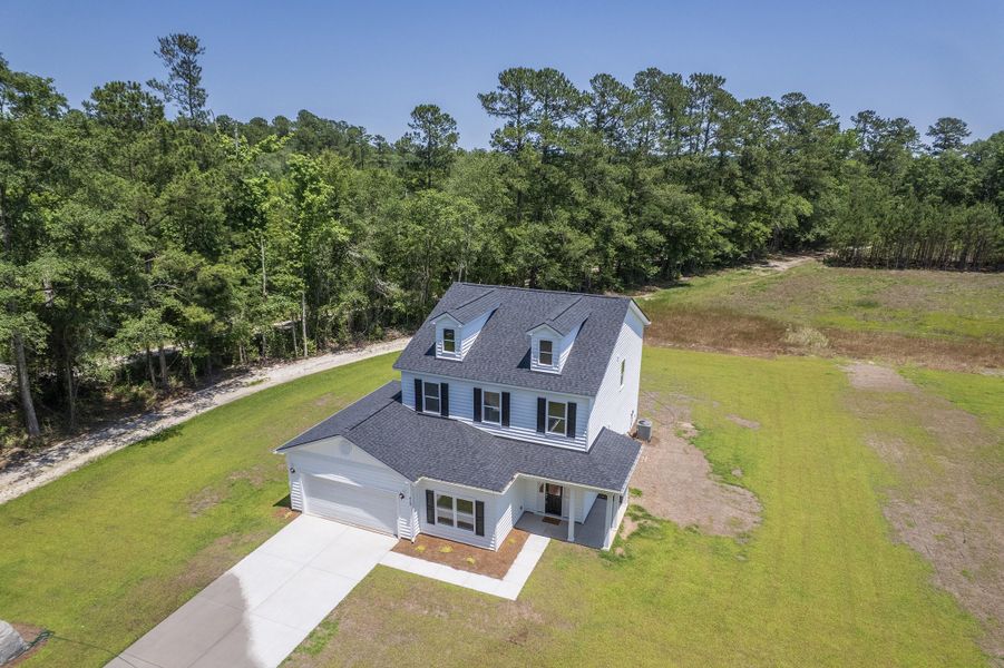 Front exterior of a new home in , Dorchester, SC, highlighting curb appeal (Image 27).