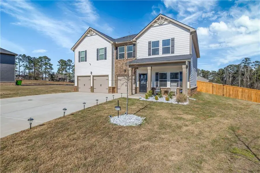 Front exterior of a new home in , McDonough, GA, highlighting curb appeal (Image 2). Front exterior of a new home in , McDonough, GA, highlighting curb appeal (Image 2).