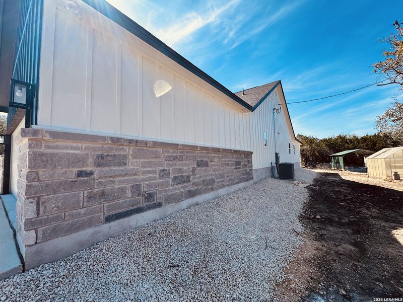 Exterior details and patio area of a home in , Fischer (Image 17).