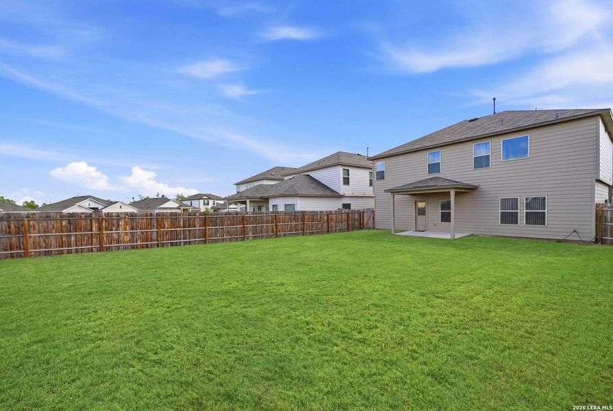 Exterior details and patio area of a home in Winding Brook, San Antonio (Image 4).