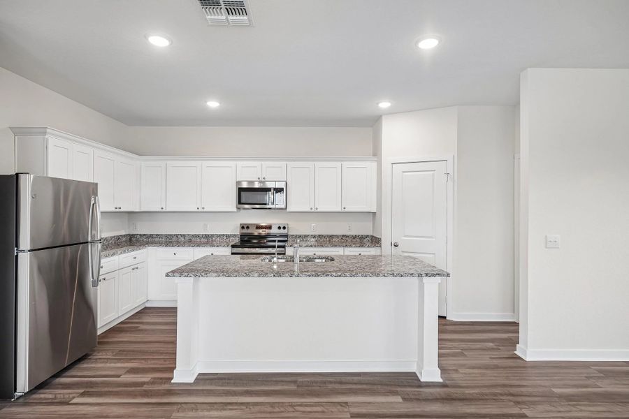 Representative furnished interior of a home built from the Prism by Starlight Homes in The Trails at Carmel, Pflugerville (Image 8). Representative furnished interior of a home built from the Prism by Starlight Homes in The Trails at Carmel, Pflugerville (Image 8).
