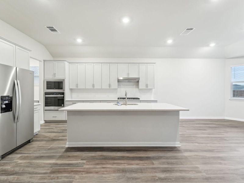 Furnished interior view inside a new home in Opal Meadows, Kyle (Image 3).