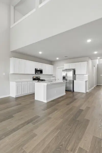 Kitchen in the Winters home plan by Trophy Signature Homes – REPRESENTATIVE PHOTO