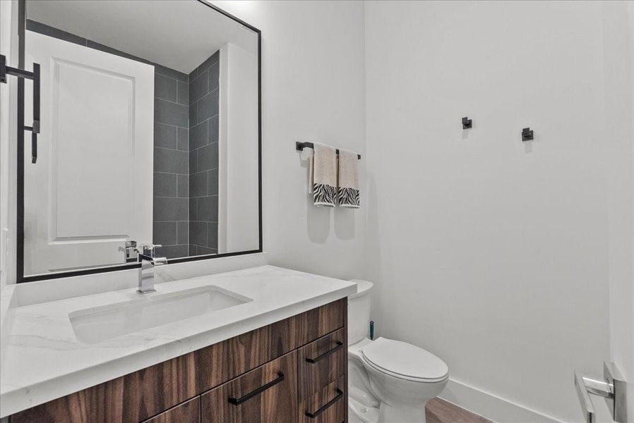 Both guest bedroom ensuites have a shower/tub combo.