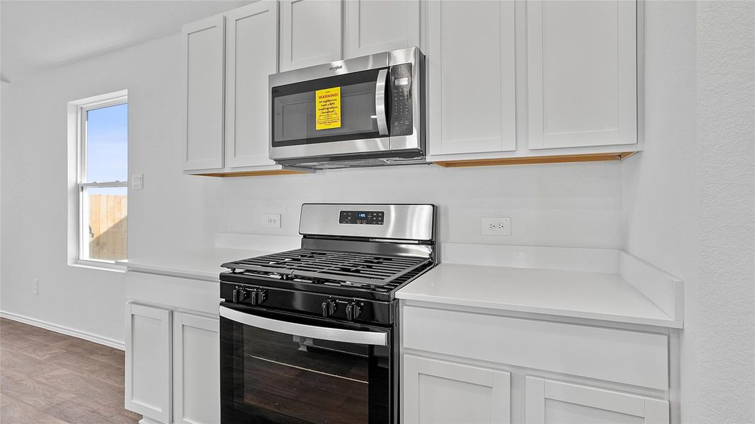 Furnished interior view inside a new home in Marigold, Kyle (Image 8).