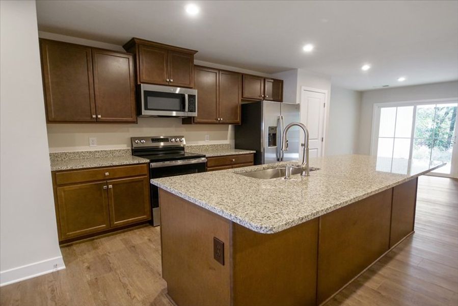 Furnished interior view inside a new home in Arden Woods Villas, Greenville (Image 2).