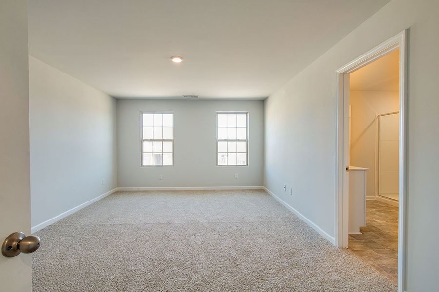 Representative unfurnished interior of a home built from the HAYDEN by D.R. Horton in The Parks, White House (Image 19).