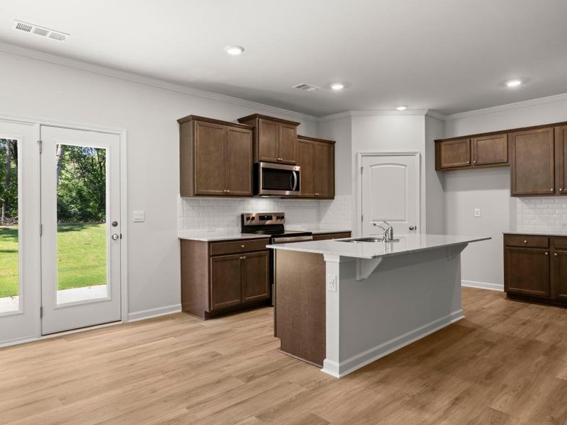 Furnished interior view inside a new home in Falcon Landing Townhomes, Gainesville (Image 9).