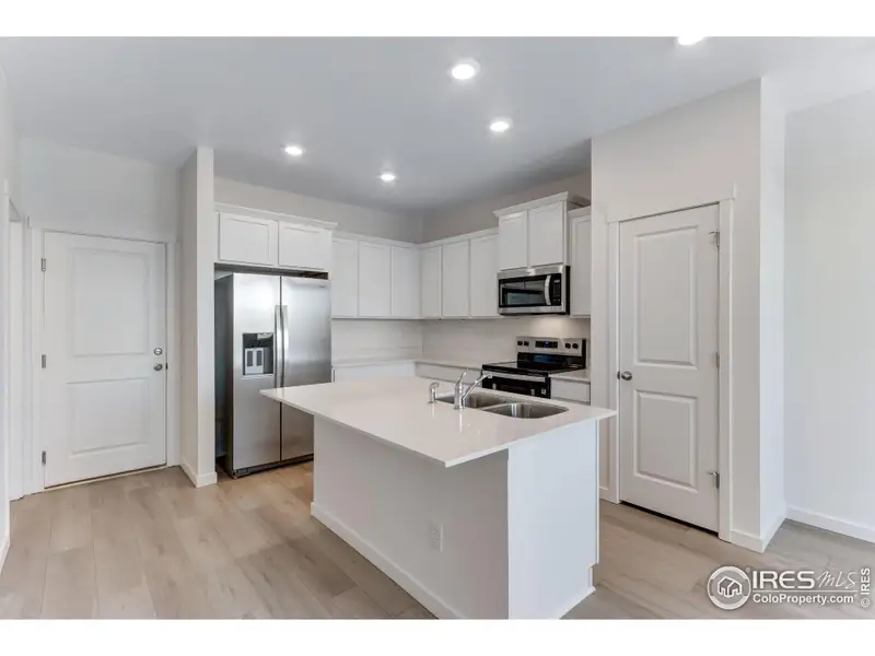 Furnished interior view inside a new home in Vista Meadows, Fort Lupton (Image 4).