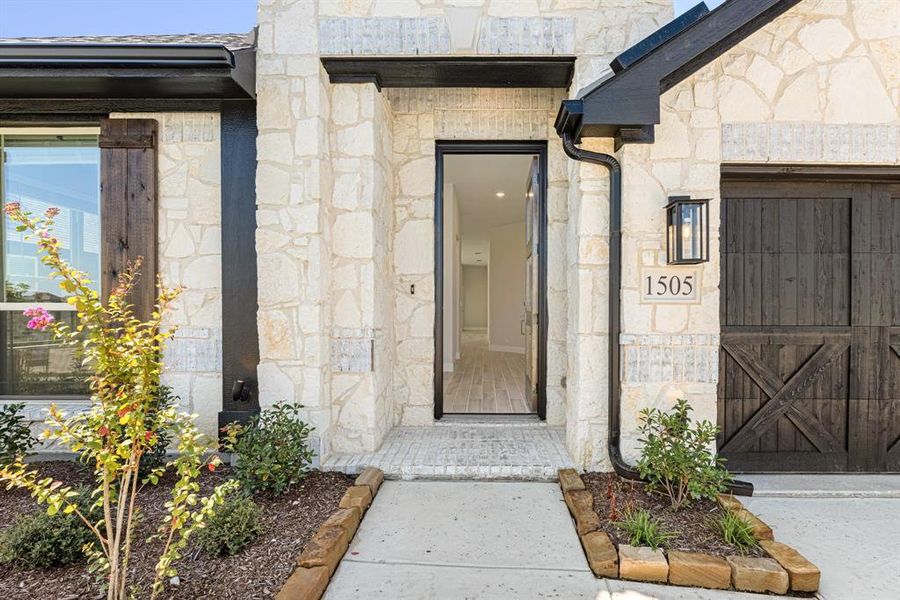 Front exterior of a new home in Devonshire Classic 50-55, Forney, TX, highlighting curb appeal (Image 23). Front exterior of a new home in Devonshire Classic 50-55, Forney, TX, highlighting curb appeal (Image 23).