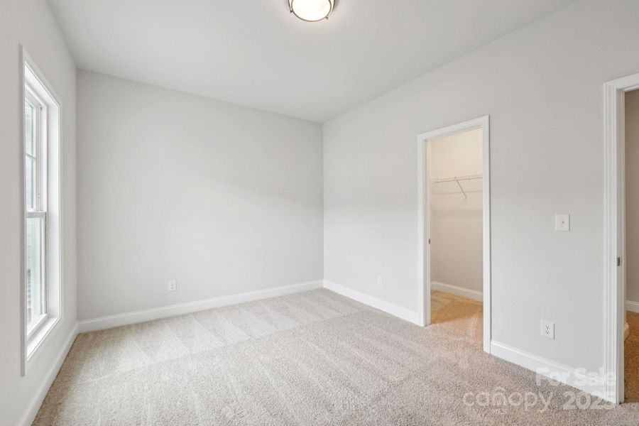 Spacious, unfurnished interior of a new home in Walk23, Huntersville (Image 33).