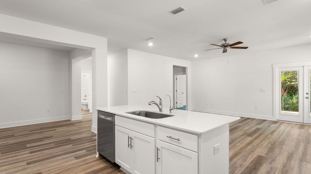 Furnished interior view inside a new home in Bayside at Ward Creek, Panama City Beach (Image 8).