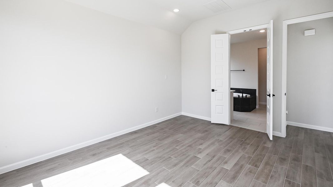 Spacious, unfurnished interior of a new home in 6 Creeks, Kyle (Image 22).