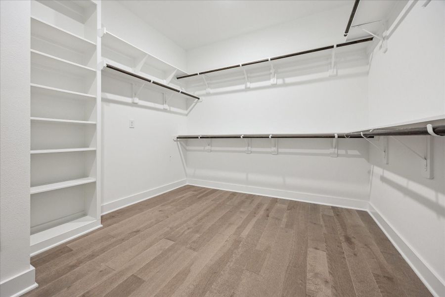 Primary Bedroom's Walk In Closet. Primary Bedroom's Walk In Closet.