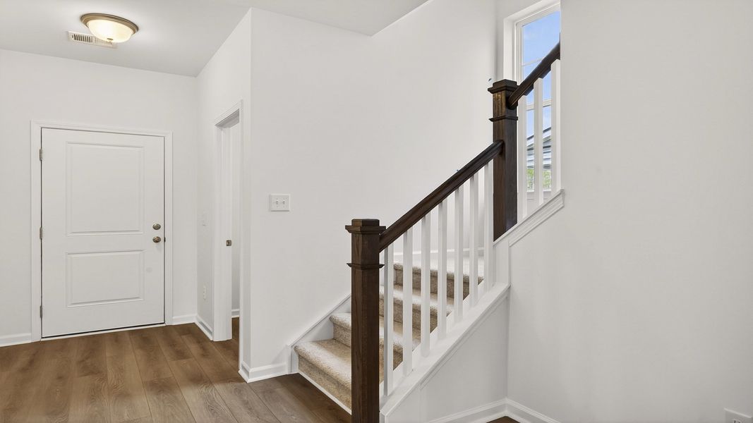 Furnished interior view inside a new home in Creekside at Andrews, Summerville (Image 23).