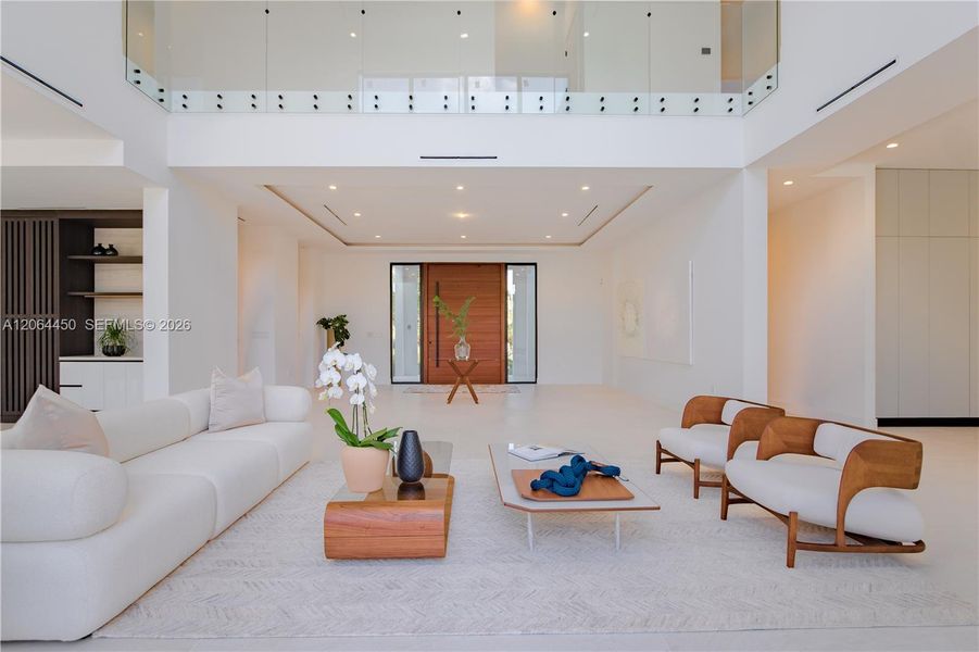 Living area with high ceilings