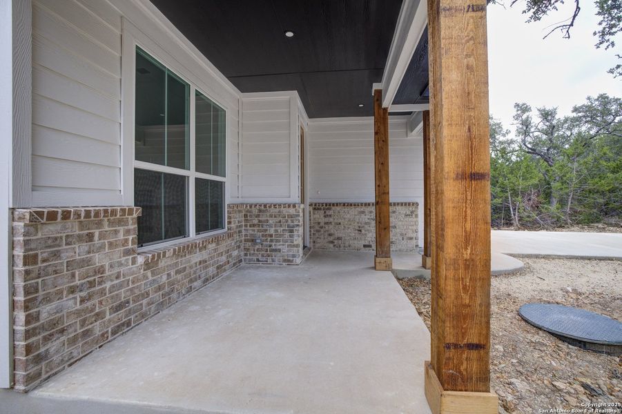 Exterior details and patio area of a home in , Wimberley (Image 22).