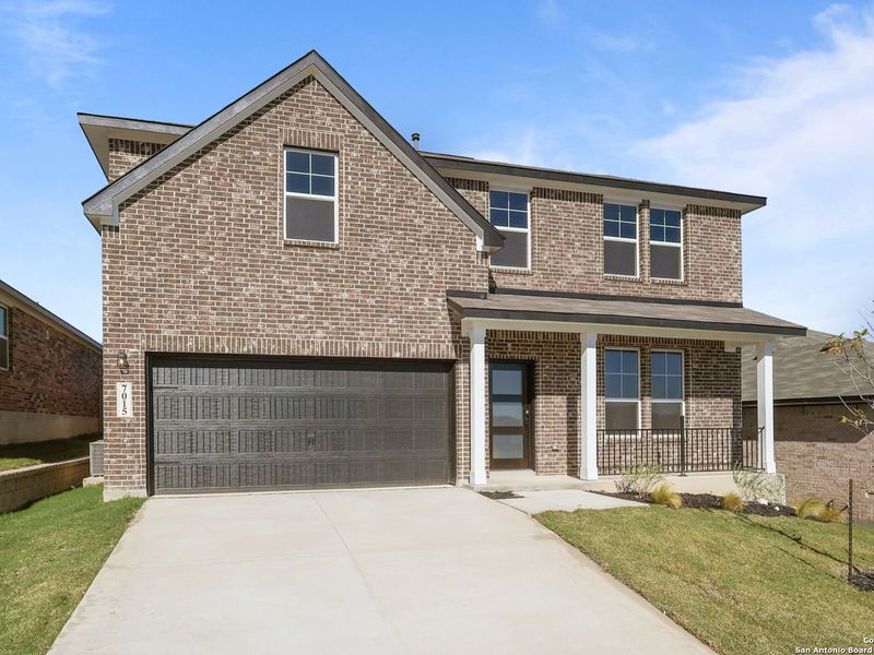 Front exterior of a new home in Comanche Ridge, San Antonio, TX, highlighting curb appeal (Image 28).