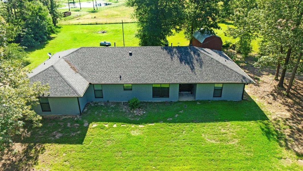 Exterior details and patio area of a home in , Powderly (Image 16).