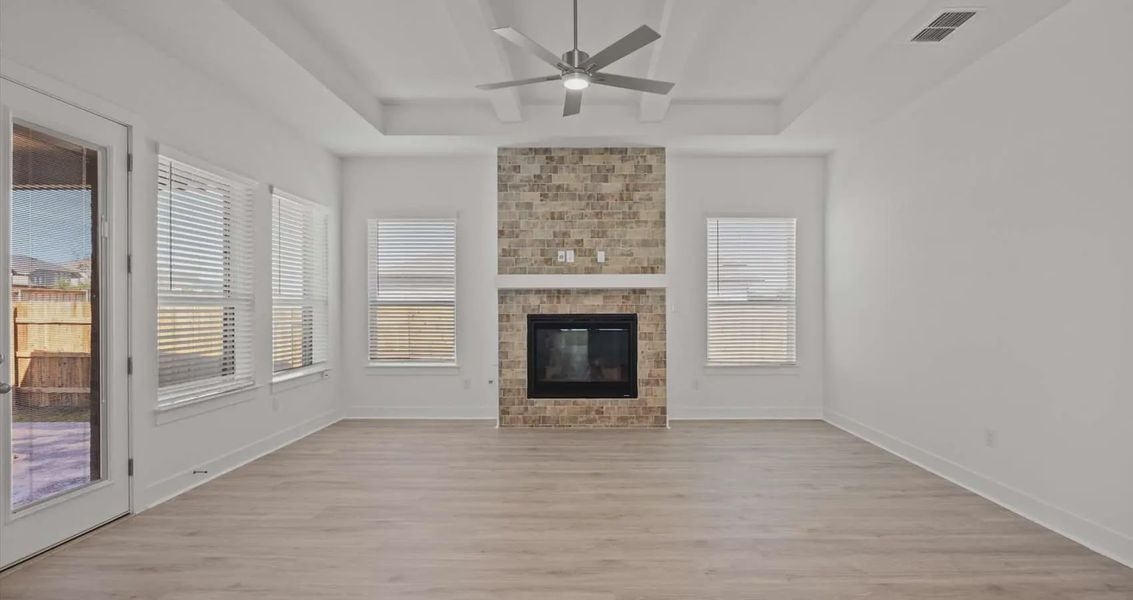 Representative unfurnished interior of a home built from the Samantha by Chesmar Homes in Village at Three Oaks, Seguin (Image 8).