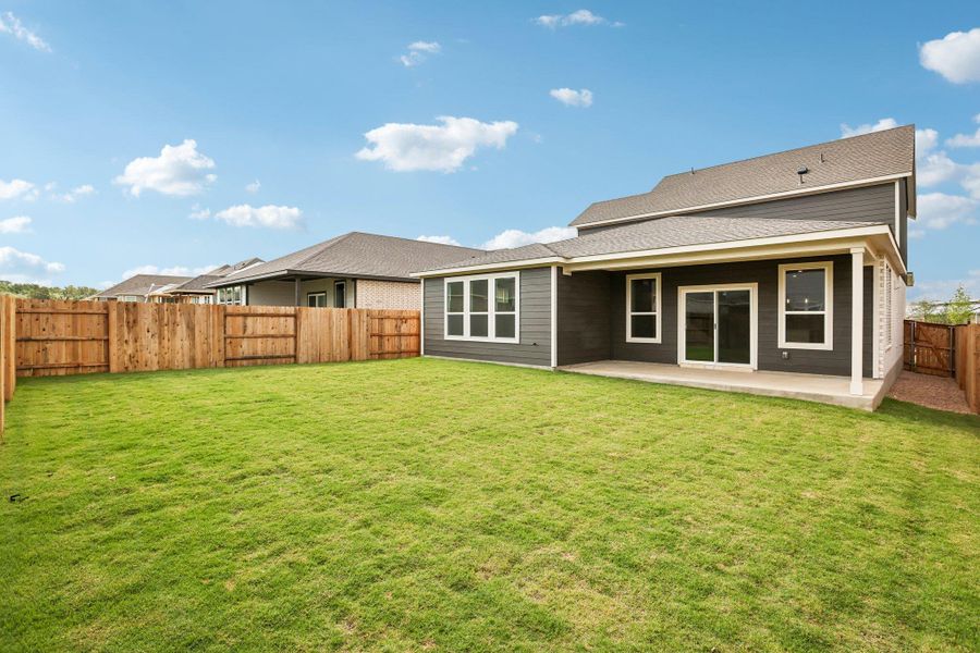 Exterior details and patio area of a home in Freedom at Anthem, Kyle (Image 3). Exterior details and patio area of a home in Freedom at Anthem, Kyle (Image 3).