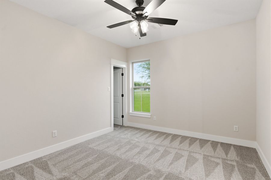 Spacious, unfurnished interior of a new home in Windmill Hill, Bryan (Image 22).