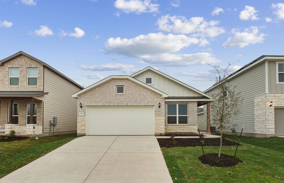 Front exterior of a new home in Sunfield, Buda, TX, highlighting curb appeal (Image 20).