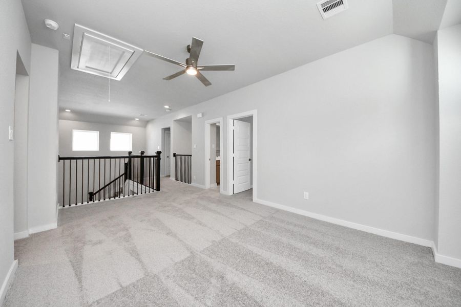 Come upstairs and enjoy a day of leisure in this fabulous game room! This is the perfect hangout spot or adult game room! Features plush carpet, high ceilings, custom paint and windows for plenty of natural light. Come upstairs and enjoy a day of leisure in this fabulous game room! This is the perfect hangout spot or adult game room! Features plush carpet, high ceilings, custom paint and windows for plenty of natural light.