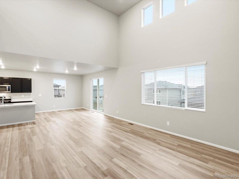 Spacious, unfurnished interior of a new home in Buffalo Highlands: The Flora Collection, Commerce City (Image 26). Spacious, unfurnished interior of a new home in Buffalo Highlands: The Flora Collection, Commerce City (Image 26).