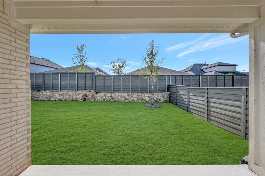 Exterior details and patio area of a home in Union Park, Little Elm (Image 3).