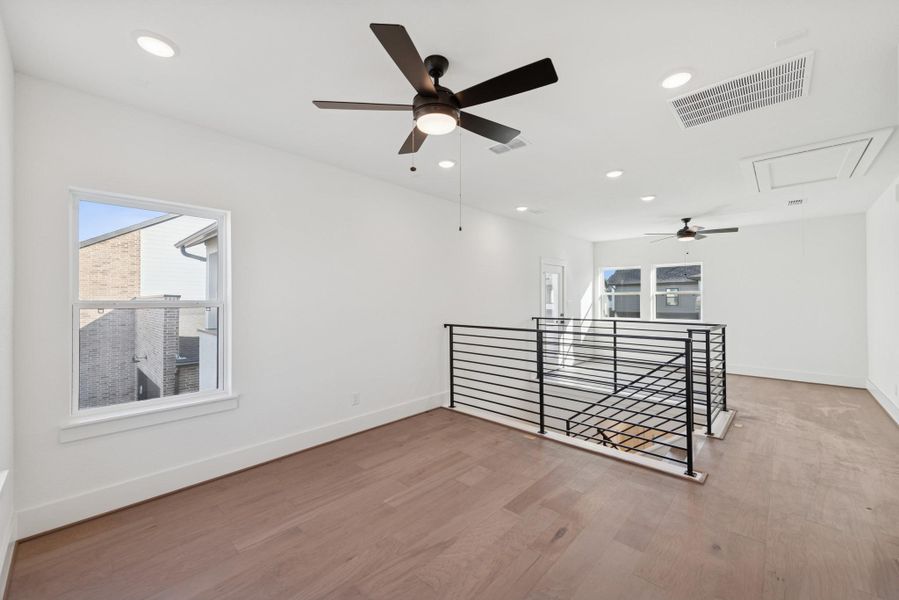 Spacious, unfurnished interior of a new home in Easthaven at Bridgeland Central - Horizon Collection, Cypress (Image 26).