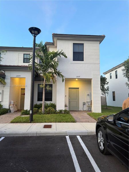 Front exterior of a new home in , Miami, FL, highlighting curb appeal (Image 18).