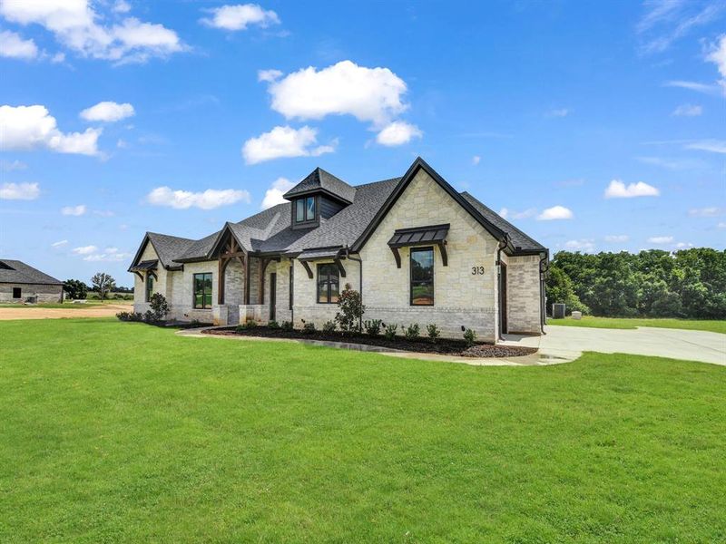 Exterior details and patio area of a home in , Weatherford (Image 28).