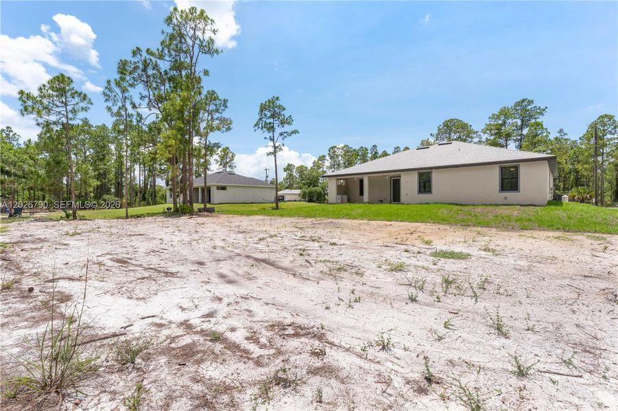 Exterior details and patio area of a home in , Lehigh Acres (Image 4).