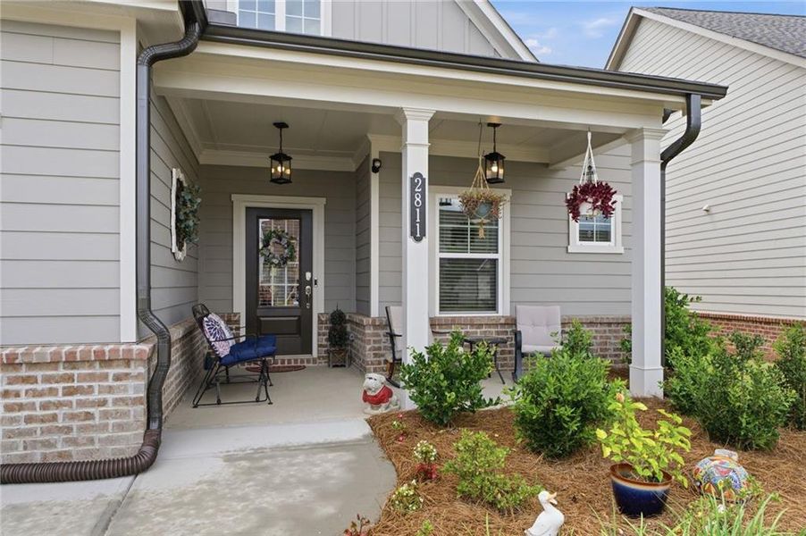 Exterior details and patio area of a home in The Court at Gainesville Township, Gainesville (Image 4).