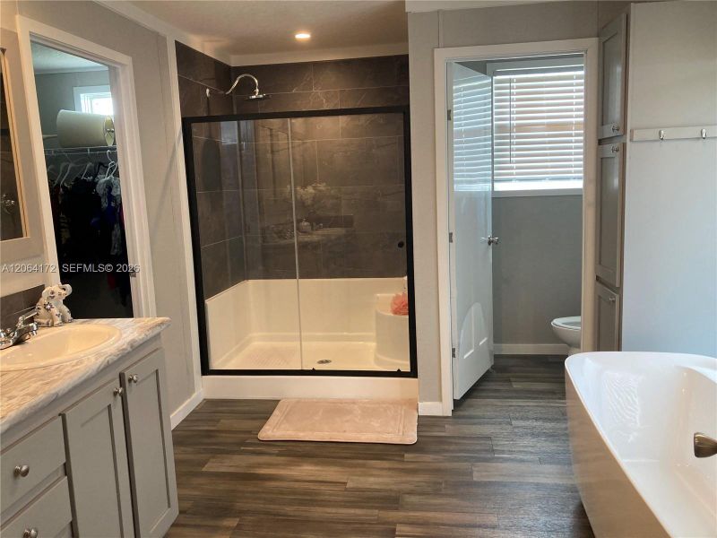 Furnished interior view inside a new home in , Clewiston (Image 26).