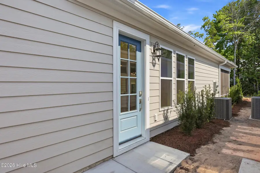 Exterior details and patio area of a home in East & Mason, Wilmington (Image 3). Exterior details and patio area of a home in East & Mason, Wilmington (Image 3).